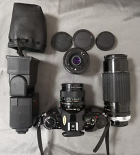 Canon A-1 Filmkamera mit FD 1 1:14 Objektive+Zubehör in AKO Kameratasche Vintage