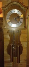 Wanduhr mit Kettenzugwerk von