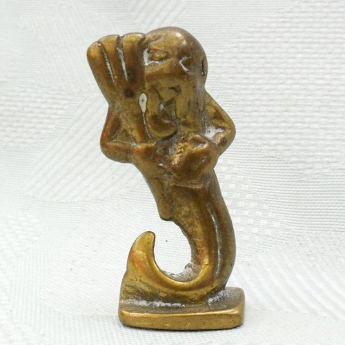 Messing figur gluttöter - messing,