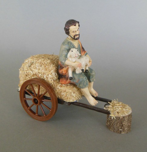 Hirte mit lamm auf - auf, strohwagen