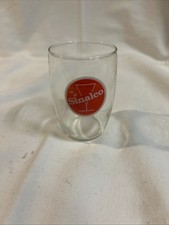 altes Trinkglas mit Reklame