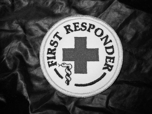 First responder rundemblem - first,
