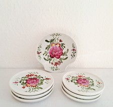 Sechs Porzellan Untersetzer