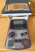 Nintendo Game Boy Color-transparent mit aufsetzbarer Lupe u. 4 Spielen