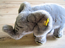 Steiff Trampili Baby Elefant - 063411 - 25cm mit Knopf, Schild, Fahne