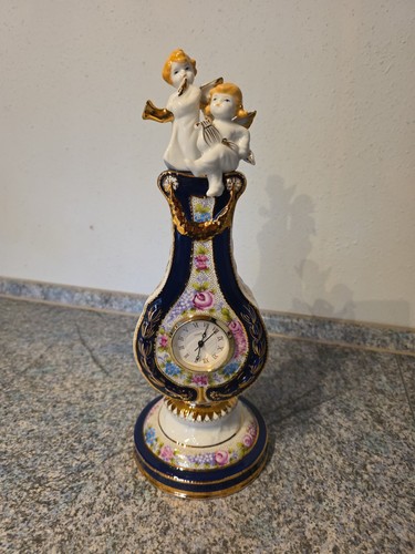 Schöne porzelan uhr - porzelan,