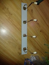 Alter Hakenleiste Holz, Kult