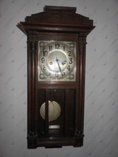 Old wall clock - pendulum,