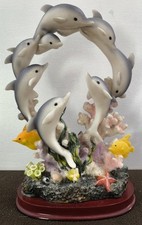 1 Dekofigur mit 8 Delphinen und 2 gelben Fischen, guter Zustand