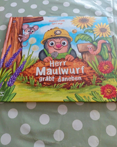 Herr maulwurf gräbt - herr, daneben