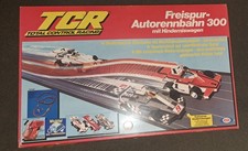 TCR Autorennbahn 300 + Rundenzähler (70er Jahre) – komplett mit 5 Autos & OVP