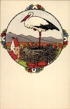 Künstler Ak Hansi, Storch im Storchennest, Elsass - 11130135