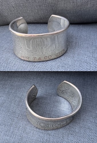 Tiffany bone cuff - &,