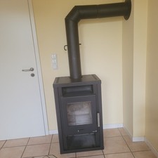 Holzofen der Firma Wamsler schwarz 5 kW mit Ofenrohr gebraucht wenig benutzt