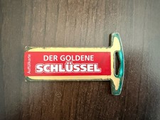 Goldener Schlüssel rot für