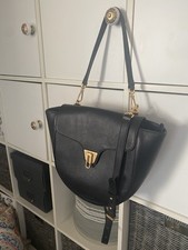 Coccinelle Designer Handtasche mit zwei Henkeln.  Leder schwarz 