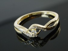 333 Gold  Ring mit gefaßten Zirkonia Steinen  Größe 50  Ringbreite 5,7 mm