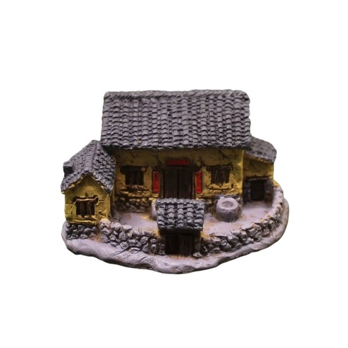Miniaturhaus mit steinstruktur - miniaturhaus,