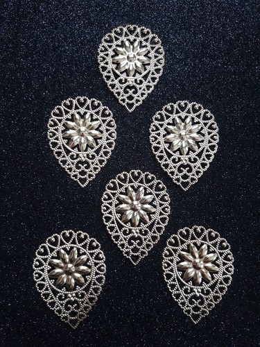 Stück metall ornamente - 6,