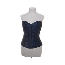 Revanche de la Femme, Korsett