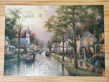 1000 Teile Thomas Kinkade Puzzle: "Hometown Morning" ca. 69x49 cm von Schmidt