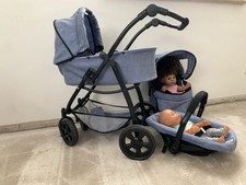 Puppenwagen  mit 2 Puppen