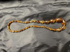 Echte Bernsteinkette, Oliven