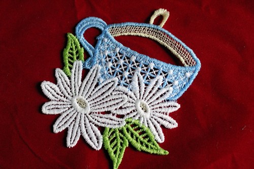 Fensterbild aus spitze tasse - fensterbild,