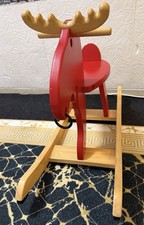 Rotes Ikea Holz-Schaukeltier