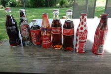 8 St. Coca cola  alte Flaschen Glas ALU 75 Jahre Sammlung selten Olympia  Neu