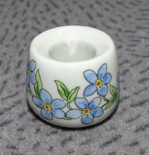 6 kleine Kerzenhalter aus