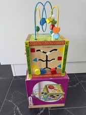 Eichhorn Spielecenter Holz mit Motorikschleife, Uhr, Formenlernen