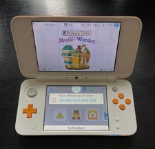 New Nintendo 2DS XL Handheld-Spielekonsole - Weiß/Orange und 4 Games