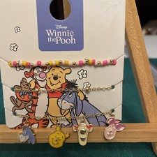 DISNEY WINNIE THE POOH 3 X BETTELARMBÄNDER MIT 4 EMAILLE CHARMS NEU PRIMARK