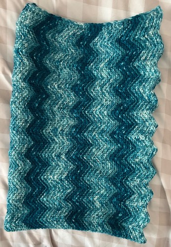 Handgestrickte/gehäkelte