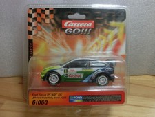 1:43 Carrera GO 61060 Ford Focus RS WRC 06  World Rally Team in geöffneter OVP