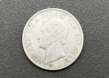 900/- Silbermünze, Ein