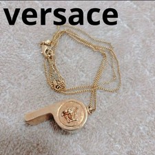 Versace Medusa Pfeife Motiv