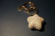 Goldfarbener Schlüsselanhänger mit Strass besetztem Stern-L 10cm Stern ca.5x3 cm