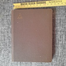 kleines Briefmarkenalbum mit Marken aus den USA und Canada