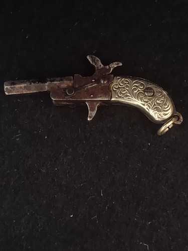 Pistola berloque - de,