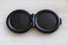 Neun Original Objektivdeckel