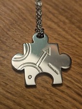 Halskette mit Puzzle-Anhänger