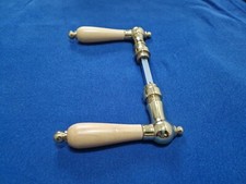 Ghidini Rossetti Türgriff Oscar, Messing poliert, Kiefer Rosettengarnitur 