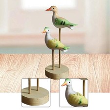 d'Vogelfigur aus Holz