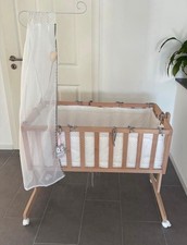Babybett mit Wiegefunktion +