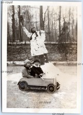 Children in Pedal Car in Front