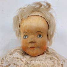 x-95768	Alte Holzkopf Puppe