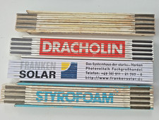 Konvolut 4x ZOLLSTOCK, Metermass je 2m zT. 60er Jahre und seltene Motive