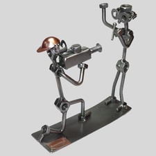 SCHRAUBENMÄNNCHEN Reporter mit Kameramann